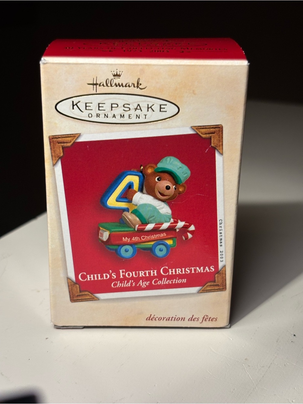 Hallmark Child's Fourth Christmas Bear Ornament - Red, Green, Blue